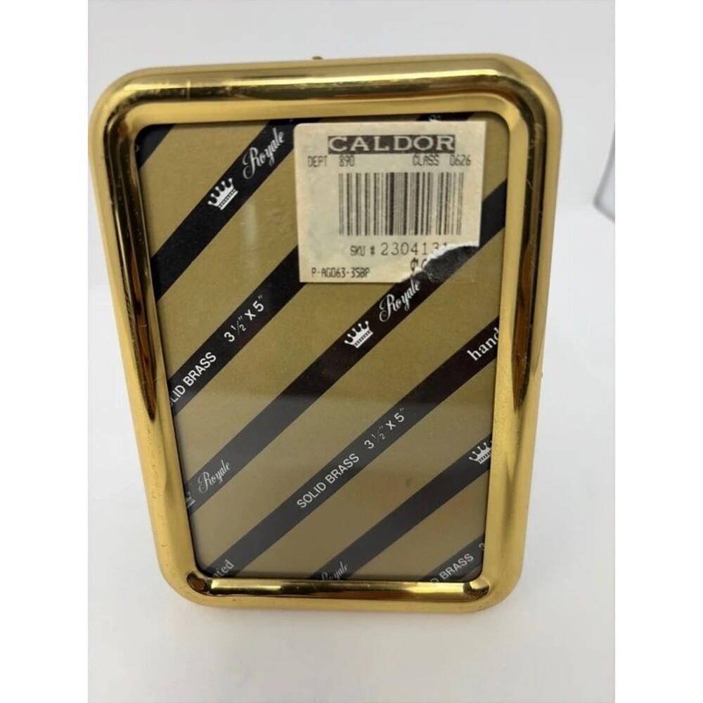 Vintage gold colored solid brass picture frame velvet back read description